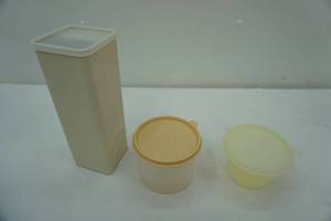lot 386 image: Tupperware cheese keeper with center holder and other storage