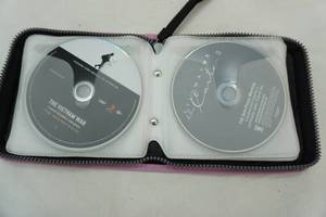 lot 398 image: CD case and contents  Kings of Leon, Atmosphere, Red Hot Chili Peppers, Sublime