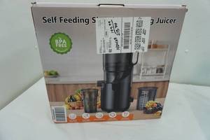 lot 404 image: Self Feeding Juicer (retail over $200)