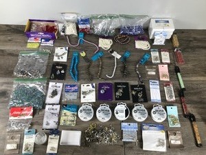 lot 46 image: Lot of Jewelry Making Material & More - Glass Beads - Clasps - Silver Beading Wire - Pendants - Jewelry Boxes - Split Rings - Earring Backs - Elastic Cord