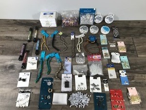 lot 48 image: Lot of Jewelry Making Material & More - Glass Beads - Clasps - Silver Beading Wire - Pendants - Jewelry Boxes - Split Rings - Earring Backs - Elastic Cord