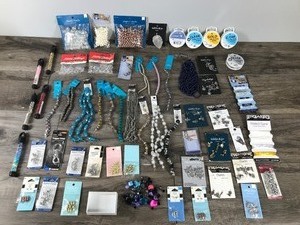 lot 52 image: Lot of Jewelry Making Material and More - Plastic-Metal & Glass Beads - Clasps - Split Rings - Pendants - Charms - Beading Wire - Stretch Cord
