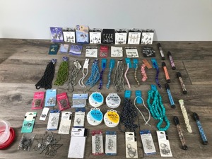 lot 60 image: Lot of Jewelry Making Material - Clear stretch cord - silver beading wire - gold beading wire - pendants - charms - glass beads - rose quartz beads - natural shell beads - earring cards - lobster clasps - barrel clasps - rings - ear wires