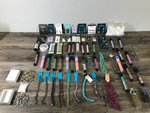 lot 66 image: Lot of Jewelry Making Material - Silver beading wire - Jump rings - Glass beads - Metal chain - Metal beads - Stone strand - Floral wire - Pendants - Charms