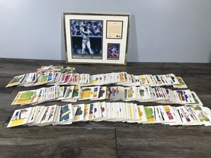 lot 77 image: Large Lot of Baseball Card Puzzle Pieces and a Frank Thomas The Big Hurt Numbered Picture with Card #5344
