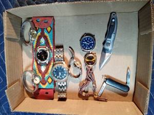 lot 152 image: Flat of watches and knives