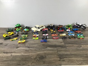 lot 111 image: Lot of Die Cast Trucks  Cars  Motorcycles & More - Hot Wheels - Monster Trucks - Batman Cars - Mario Car and More