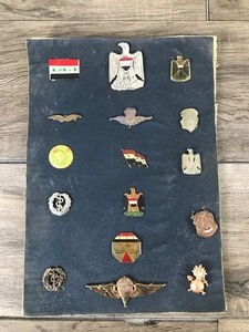 lot 149 image: Iraqi Military Souvenir Pins and More Board