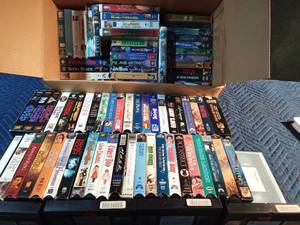 lot 235 image: 2 boxes of VHSs including Star Wars box set