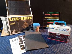 lot 201 image: Light Bright, Fisher Price barn lunch box, and a bead math calculator