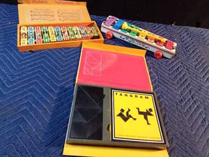 lot 192 image: Vintage portable xylophone, Fisher Price xylophone, and a ancient Chinese puzzle