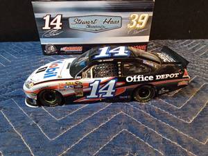 lot 186 image: Nascar Tony Stewart #14 Mobil 1 die cast car featuring 201 individual parts