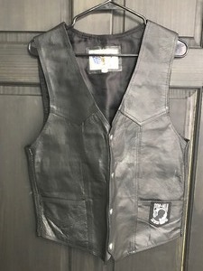 lot 367 image: Leather Wear Vest - POW MIA You Are Not Forgotten Patch on the Front & the American Flag on the Back - Size M