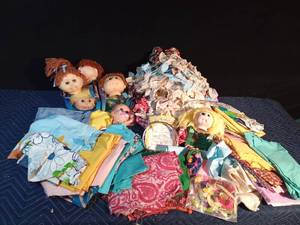 lot 241 image: Look-a-like Cabbage Patch doll heads, material, lacy trim and more