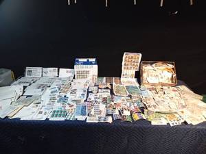 lot 245 image: Unused and used stamps - First day issues, full pages and blocks, full books, stamped postcards and envelopes