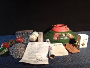 lot 254 image: Christmas items including Jiminy cricket hallmark light up ornament and a tree stand