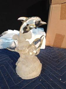 lot 265 image: Led color changing dolphins