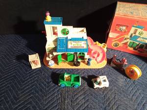 lot 279 image: 1976 fisher Price play family Sesame Street clubhouse with accessories and original box