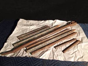 lot 284 image: Pry bar and steel stakes (great for horseshoe stakes)