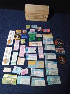 lot 333 image: Wood box of concert, Renaissance, and fair tickets and patches