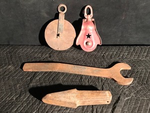 lot 19 image: 2 - Vintage Pulleys  Large Wrench and a Tooth to a Loader Bucket