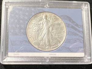 1986 AMERICAN SILVER EAGLE 1 TROY OZ .999 FINE SILVER IN CASE