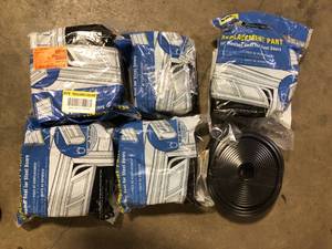 lot 22 image: Lot of Clopay 18 ft. Replacement Garage Door Bottom Weatherseal  Customer Returns See Pictures