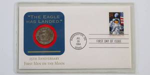 lot 64 image: Uncirculated First Men of the Moon 25th Anniversary Coin & Stamp