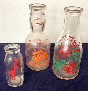 lot 15 image: Group of 3 Vintage Milk Bottles