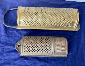 lot 71 image: Pair of Antique Hand Graters