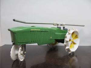 lot 64 image: JOHN DEERE Cast Iron Walking Tractor Sprinkler
