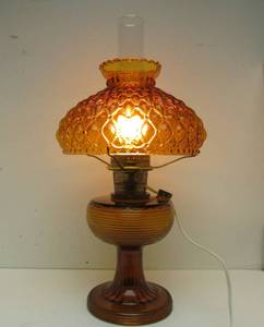 lot 80 image: Very Nice Vintage Amber Glass Electrified Aladdin Model B Beehive Oil Lamp