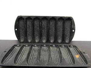 lot 106 image: Pair of Old Vintage LODGE Cast Iron Cornbread Pans