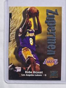 lot 24 image: Kobe Bryant 1998 Skybox Zupermen Card No. 195