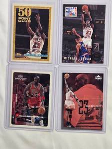 lot 37 image: Lot of 4 Michael Jordan Basketball Trading Cards
