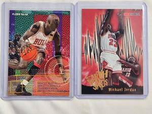 lot 54 image: Lot of 2 Michael Jordan Inserts - 1996 NBA Hoops Earth Shakers No. 358, Fleer 95-96 No. 22