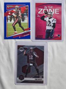 lot 65 image: Lot of 3 Tom Brady Cards - 2021 Panini Mosaic No. 201, 2021 Donruss No. 1, 2020 Score No. IZ-TB