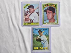 lot 76 image: Lot of 3 Luis Aparicio Baseball Cards - 1966 Topps No. 90, 1972 Topps No. 313, 1967 Topps No. 60