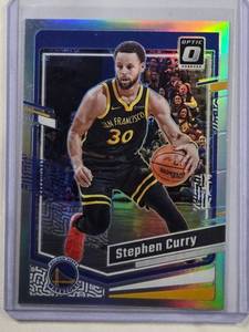 lot 93 image: Stephen Curry 2023-2024 Panini Optic Silver Holo Prizm Basketball Trading Card No. 198