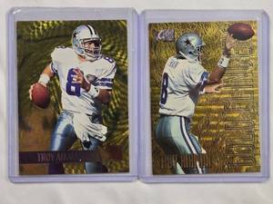lot 101 image: Troy Aikman Gold Plated Football Trading Cards in Protective Sleeves