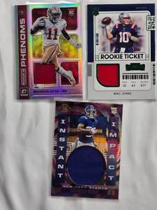 lot 130 image: Lot of 3 NFL Relic Cards - Brandon Aiyuk, Mac Jones, Kadarius Toney
