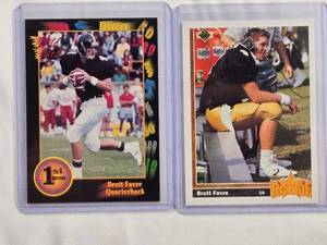 lot 139 image: Lot of 2 Brett Favre Rookie Cards - 1991 Star Rookie No. 13 and Wild Card No. 119