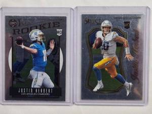 lot 212 image: Lot of 2 Justin Herbert Rookie Cards -2020 Panini Select No. SCR-4 & 2020 Panini Chronicles Legacy No. 203