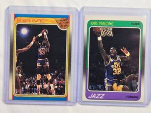 lot 242 image: Lot of 2 - Karl Malone 1988 Fleer No. 114 and Patrick Ewing1988 Fleer All-Star No. 130 Vintage Basketball Cards