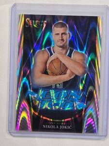 lot 264 image: Nikola Jokic 2023-24 Panini Select Lava Refractor Neon Icon No. 23