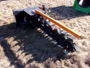 lot 5 image: Wolverine Skidsteer Mount 48 Trencher (UNUSED)