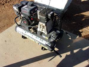 lot 56 image: Central Pneumatic Gas Powered Air Compressor