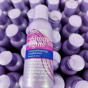 lot 82 image: New Case72-2oz Bottles Of Clairol Professional Shimmer Lights Color-Enhancing Conditioner Blonde & Silver