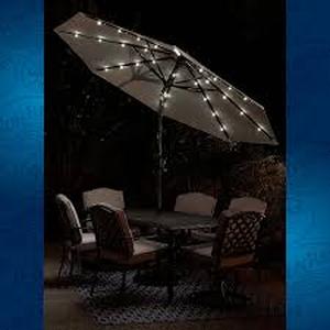 lot 141 image: Sun Ray - 9 Round Solar Lighted Umbrella - Taupe