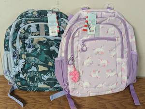 lot 198 image: His and Hers - Cat & Jack Backpacks - UnicornDinosaur with pop its (2 backpacks)